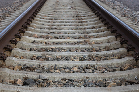 Railroad tracks close up on the selective focus and blurred background