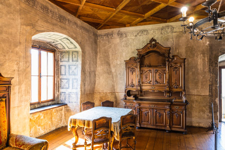 Vintage furniture in the Medieval Orava Castle. Oravsky Podzamok, Slovakia, 21 July 2022.のeditorial素材