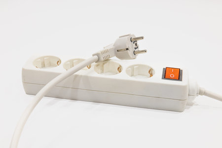 Unplugged the power cord and outlet extension socket. Concept of expensive electricity costs.