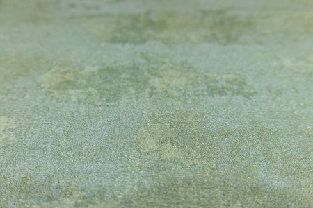 Blurred defocused background of textured wallcovering surfaceの写真素材
