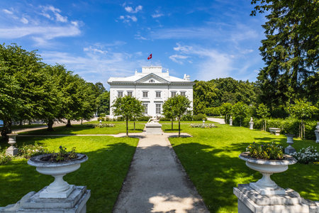 Uzutrakis manor. Colonnaded mansion set in landscaped gardens. Trakai, Lithuania, 2 July 2022.のeditorial素材