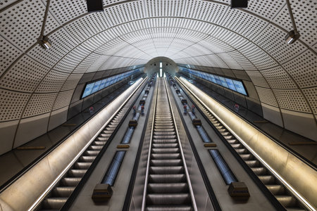Futuristic Escalators in London Underground Station. Modern Architecture and Lighting