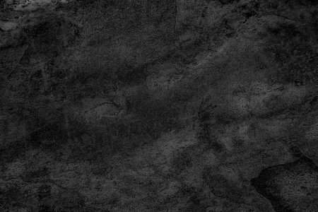 Dark Stone Texture with Rugged Surface Details and Subtle Natural Patternsの写真素材