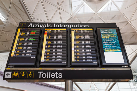 Airport Arrivals Information Display Board Showing Flight Status Updatesの写真素材