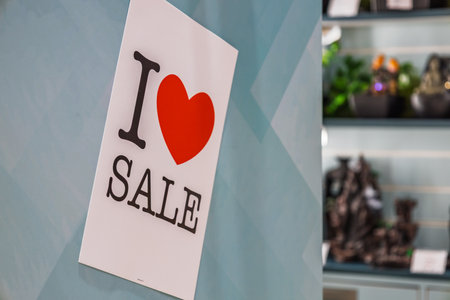 I Love Sale - sign displayed inside retail store during seasonal promotionの写真素材