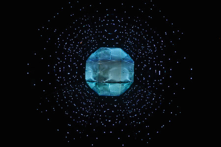 Futuristic glowing blue geometric sphere with floating particlesの写真素材