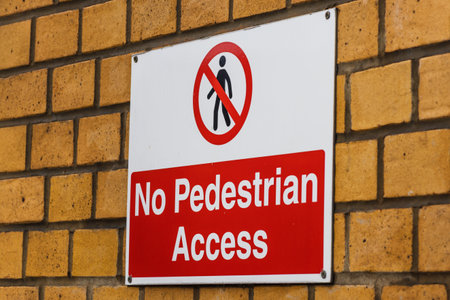 Safety sign indicating no pedestrian access on restricted area with clear prohibition symbolの写真素材
