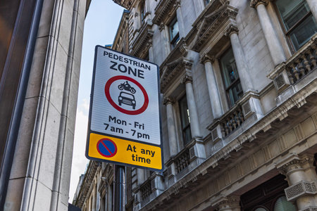 Pedestrian Zone Sign in Urban Street Indicating Restricted Vehicle Access and Safety Regulations