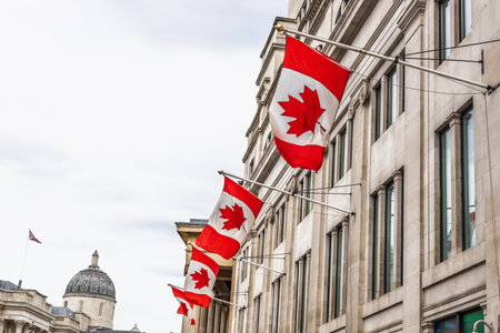 Canadian Flags Lining the Facade of Canada House in London Iconic Westminster Districtの写真素材