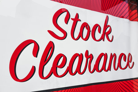 Bold red Stock Clearance sale banner on white background, perfect retail discount noticeの写真素材