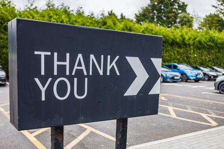 Thank You Sign with Directional Arrows at Parking Lot Exit for Clear Wayfinding