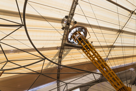 Radial cable and mast detail of a tensile membrane roof on a modern stadium canopyの写真素材