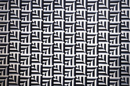 Optical illusion geometric pattern in black and white, repeating maze backgroundの写真素材