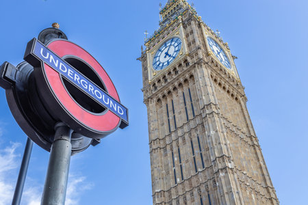 London Underground sign with Big Ben in the background. London, UK, 9 July 2023