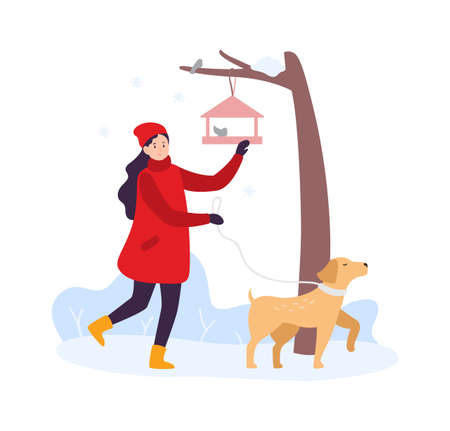 Winter activities. Girl walking with dog and feeding birds. Woman character in winter clothing spending time outdoor with pet. Feeder hanging on tree branch with birds vector illustrationのイラスト素材