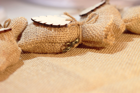 Two bonbonniere of a  wedding. The cloth background.の写真素材