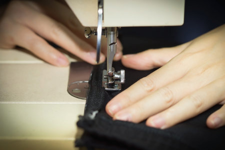 Sewing machine dark tone selective focus