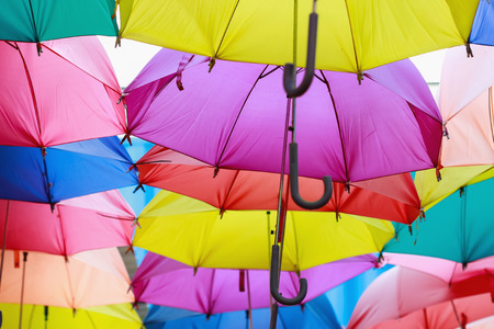 Multicolored umbrella for background selective focusの写真素材