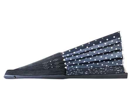 Black textile japanese fan isolated on whiteの写真素材
