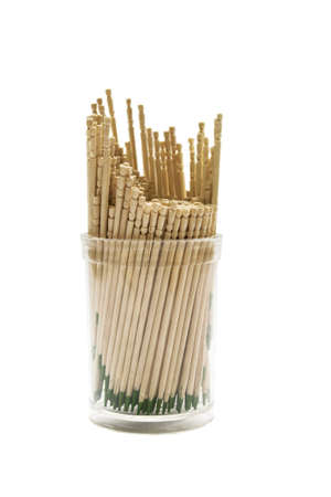 Wooden toothpicks in plastic case isolated on whiteの写真素材