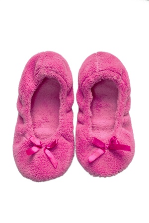 Pink soft slippers isolated on white backgroundの写真素材