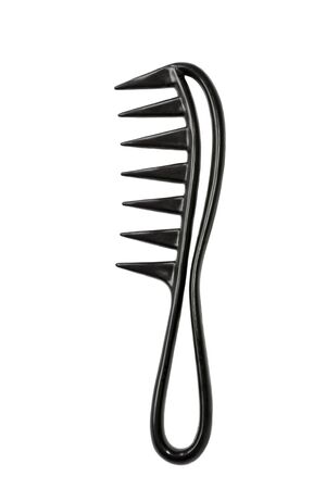 Black plastic comb isolated on white backgroundの写真素材