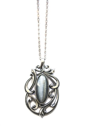 Silver pendant with big gem isolated over whiteの写真素材