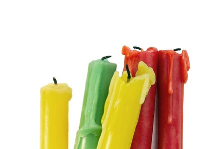 Five colored candles isolated over whiteの写真素材