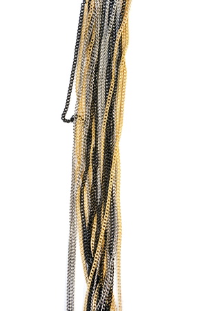 Flowing decorative metal chain isolated over whiteの写真素材