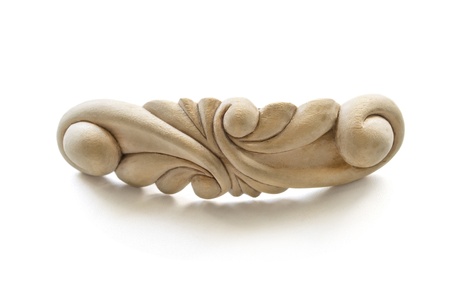 Vintage carved wooden barrette isolated over whiteの写真素材