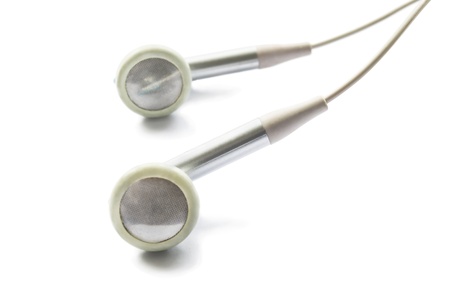 Light wired headphones isolated over whiteの写真素材