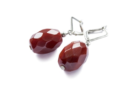 Big vintage cornelian earrings isolated over whiteの写真素材