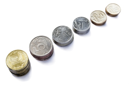Stacks of coins russian rouble of different values isolated over whiteの写真素材
