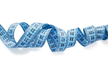 Blue measuring tape isolated over whiteの写真素材
