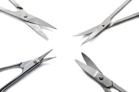 Set of four manicure scissors on white backgroundの写真素材