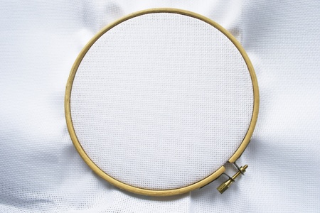 Blank white canvas on the wooden hoopの写真素材