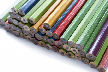 Group of multicolor unsharpened pencils closeup on white backgroundの写真素材
