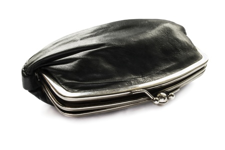 Half opened vintage black leather cosmetic bag isolated over whiteの写真素材