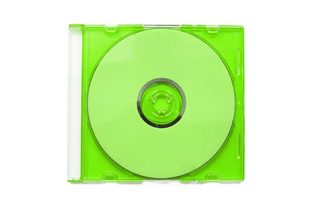Green compact disc in a plastic box on white backgroundの写真素材