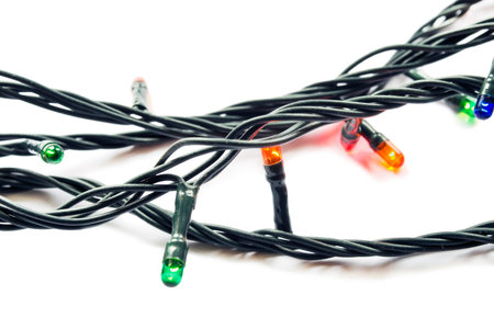 Wires with little multicolor flashlights on white backtround