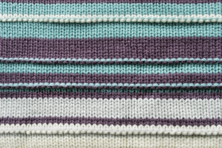 Knitwear texture with horizontal trips as a backgroundの写真素材
