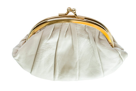 Vintage beige leather handbag with golden clasp isolated over whiteの写真素材