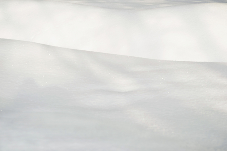 White sparkling snowdrift as a backgroundの写真素材