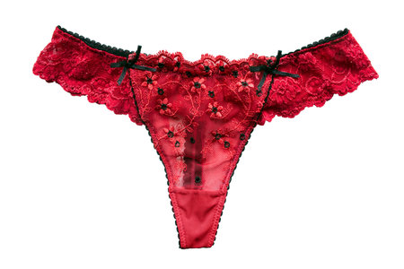 Red thong panties on white background