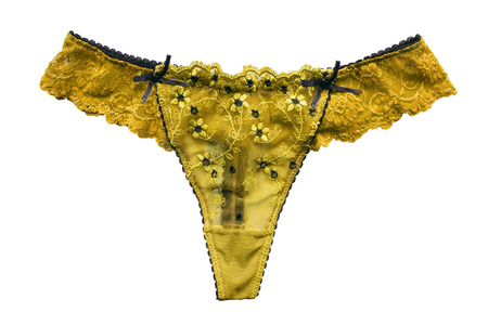 Yellow panties with black decor on white backgroundの写真素材