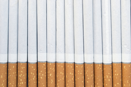 A lot of cigarettes as a backgroundの写真素材