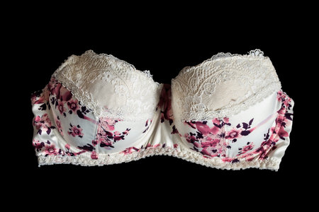 Strapless silky bra white with pink flowers on black の写真素材