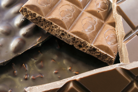 Chocolate bars of different sorts closeup の写真素材