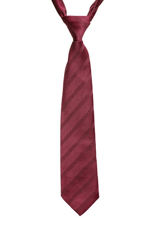 Red striped silk tie on white backgroundの写真素材