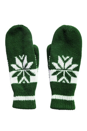Warm knitted green and white mittens isolated over whiteの写真素材
